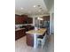 Modern kitchen boasts stainless steel appliances and a large kitchen island at 1565 Sage Treee Dr Dr, Zebulon, NC 27597