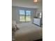 Spacious main bedroom with window views and plenty of natural light at 1565 Sage Treee Dr Dr, Zebulon, NC 27597