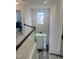 Entryway with staircase and view to front door at 1565 Sage Treee Dr Dr, Zebulon, NC 27597
