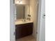 Clean bathroom with vanity, sink, and mirror at 1565 Sage Treee Dr Dr, Zebulon, NC 27597