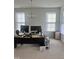 Spacious home office with ample natural light and room for two monitors at 1565 Sage Treee Dr Dr, Zebulon, NC 27597