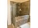 Elegant bathroom with a large glass shower and tile surround at 1565 Sage Treee Dr Dr, Zebulon, NC 27597
