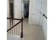 Upstairs hallway with bathroom and extra room at 1565 Sage Treee Dr Dr, Zebulon, NC 27597