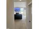 View of living room with fireplace and large TV at 1565 Sage Treee Dr Dr, Zebulon, NC 27597