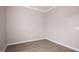Spacious bedroom with neutral walls and wood-look flooring at 1849 N Main St, Roxboro, NC 27573