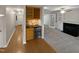 Home bar with wine storage and granite countertop at 114 Canterfield Rd, Cary, NC 27513