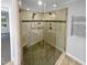 Walk-in shower with tiled walls and built-in seat at 114 Canterfield Rd, Cary, NC 27513