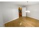 Spacious dining room with hardwood floors and light fixtures at 114 Canterfield Rd, Cary, NC 27513