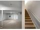 Finished basement with stairs and sliding glass doors at 114 Canterfield Rd, Cary, NC 27513