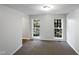 Bright and airy office with large windows and carpet at 114 Canterfield Rd, Cary, NC 27513