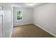 Simple bedroom with carpet and a window at 114 Canterfield Rd, Cary, NC 27513