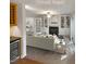 Virtually staged living room with fireplace and built-ins at 114 Canterfield Rd, Cary, NC 27513