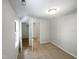 Bright bedroom with double closets and neutral walls at 114 Canterfield Rd, Cary, NC 27513