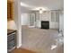 Living room with fireplace and built-in shelves at 114 Canterfield Rd, Cary, NC 27513