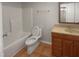 Clean bathroom with a vanity, toilet, and bathtub at 114 Canterfield Rd, Cary, NC 27513