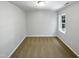 Spacious bedroom with neutral walls and carpeted floor at 114 Canterfield Rd, Cary, NC 27513