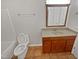 Clean bathroom with tiled floor, vanity, and bathtub at 114 Canterfield Rd, Cary, NC 27513