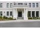 Six Twenty Wade building entrance with columns, double doors, and landscaping at 620 Wade Ave # 301, Raleigh, NC 27605