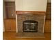 Stone fireplace with built-in shelving at 910 Vanco Mill Rd, Henderson, NC 27537