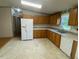 Kitchen with oak cabinets and appliances at 910 Vanco Mill Rd, Henderson, NC 27537