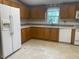 Kitchen with oak cabinets and appliances at 910 Vanco Mill Rd, Henderson, NC 27537