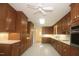 Spacious kitchen with light wood cabinets and tile floor at 492 Beechmast, Pittsboro, NC 27312