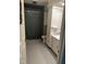 Bathroom boasts a large shower, white cabinets, and tile floors at 492 Beechmast, Pittsboro, NC 27312