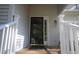 Front entry of a light gray house with brick steps at 492 Beechmast, Pittsboro, NC 27312