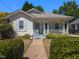 Charming yellow house with a front porch at 209 E Whitaker Mill Rd, Raleigh, NC 27608