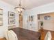 Elegant dining room with a wood table and access to kitchen at 209 E Whitaker Mill Rd, Raleigh, NC 27608
