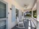 Charming front porch with rocking chairs, inviting entryway at 209 E Whitaker Mill Rd, Raleigh, NC 27608