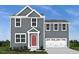 Two-story gray house with a red front door and attached garage at 234 Day Farm Dr, Lillington, NC 27546