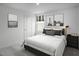 Cozy bedroom with a neutral color palette and large windows at 290 Gianna Dr, Lillington, NC 27546