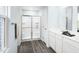 Modern bathroom with a double vanity, shower, and grey flooring at 290 Gianna Dr, Lillington, NC 27546