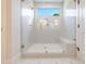 Spacious walk-in shower with glass doors and built-in bench at 212 Meadow Walk Dr, Fuquay Varina, NC 27526