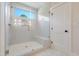 Large walk-in shower with herringbone tile and glass enclosure at 212 Meadow Walk Dr, Fuquay Varina, NC 27526