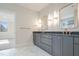 Elegant bathroom with double vanity and marble flooring at 212 Meadow Walk Dr, Fuquay Varina, NC 27526
