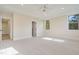 Bright and airy bedroom with carpet and an ensuite bathroom at 212 Meadow Walk Dr, Fuquay Varina, NC 27526