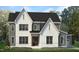 Two story home with gray siding and white trim at 212 Meadow Walk Dr, Fuquay Varina, NC 27526