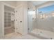 Spacious bathroom with walk-in shower, closet, and marble floor at 212 Meadow Walk Dr, Fuquay Varina, NC 27526