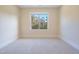 Bright bedroom with neutral walls and carpet flooring at 212 Meadow Walk Dr, Fuquay Varina, NC 27526