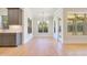 Bright breakfast area with hardwood floors and access to screened porch at 212 Meadow Walk Dr, Fuquay Varina, NC 27526