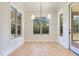 Breakfast nook features hardwood floors and a view of the backyard at 212 Meadow Walk Dr, Fuquay Varina, NC 27526