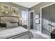 Bedroom with a bed, nightstands and gray walls at 902 Sw Maynard Rd, Cary, NC 27511