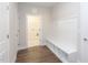 Laundry room with built-in bench and shelving at 902 Sw Maynard Rd, Cary, NC 27511