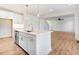 Open concept kitchen with island and stainless steel appliances at 46 Otter Hole Dr, Princeton, NC 27569