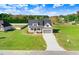 Two-story home with a front porch and gray exterior at 46 Otter Hole Dr, Princeton, NC 27569