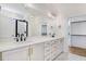 Modern bathroom with double vanity and walk-in shower at 46 Otter Hole Dr, Princeton, NC 27569