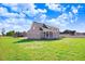 Brick house exterior with covered porch and large backyard at 46 Otter Hole Dr, Princeton, NC 27569