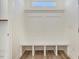 Built-in bench with storage in an entryway at 46 Otter Hole Dr, Princeton, NC 27569